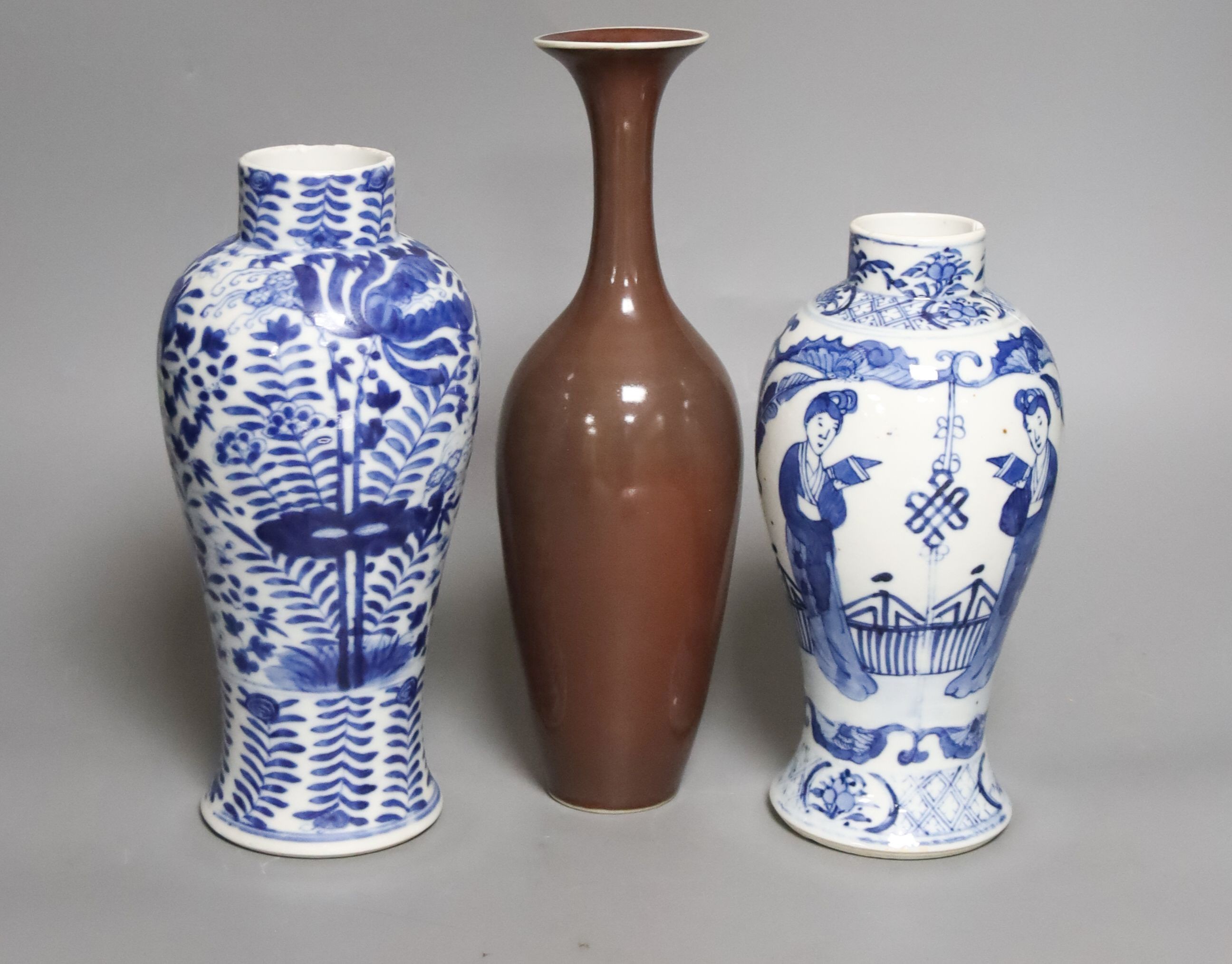 Two Chinese blue and white baluster vases, late 19th century and a Chinese sang de boeuf glazed vase, 27cm